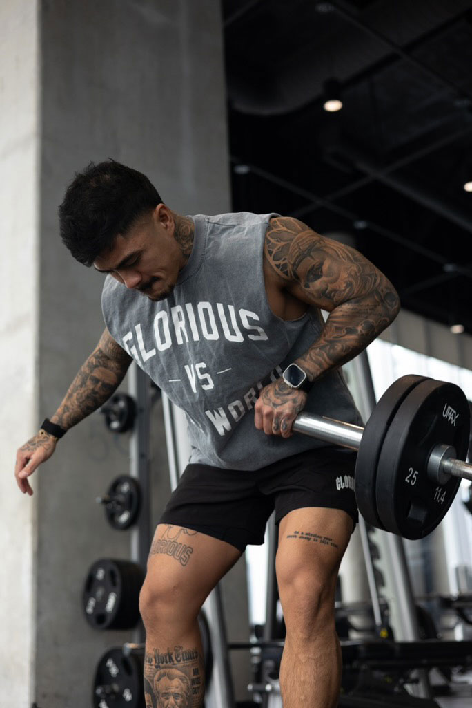 Coach in the gym working out.